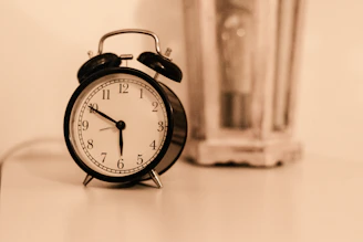 black ring bell alarm clock