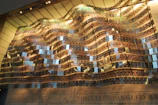 A dynamic marine system installation blending architecture with tidal waters.