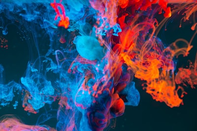 blue and orange smoke abstract teams background