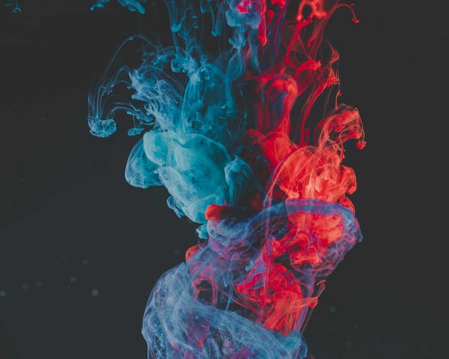 Colourful smoke against dark background