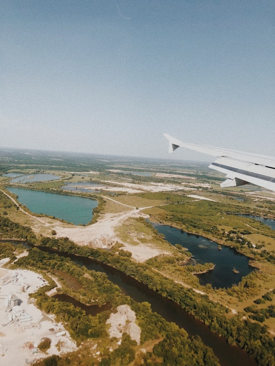 airliner view photography of forest in Austin United States