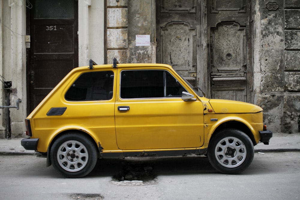 yellow 3-door hatchback