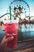 pink Disney Paris drink with green straw