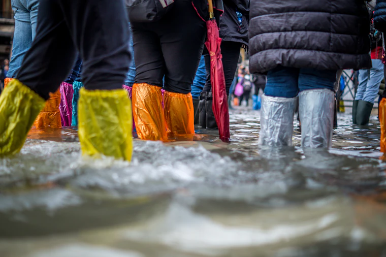 Wading through flood water
