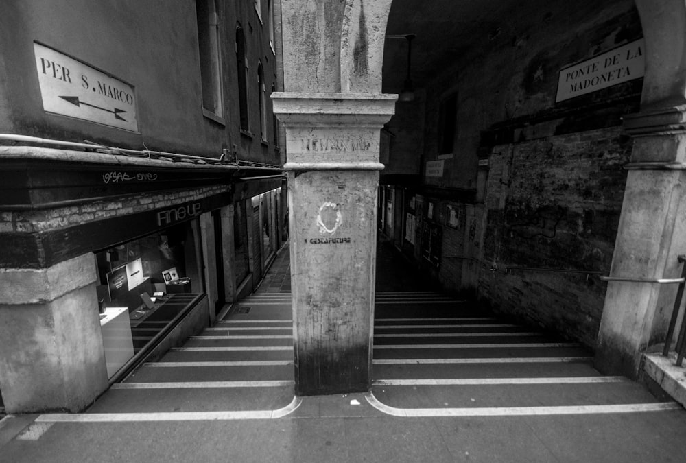 grayscale photography of empty hallway