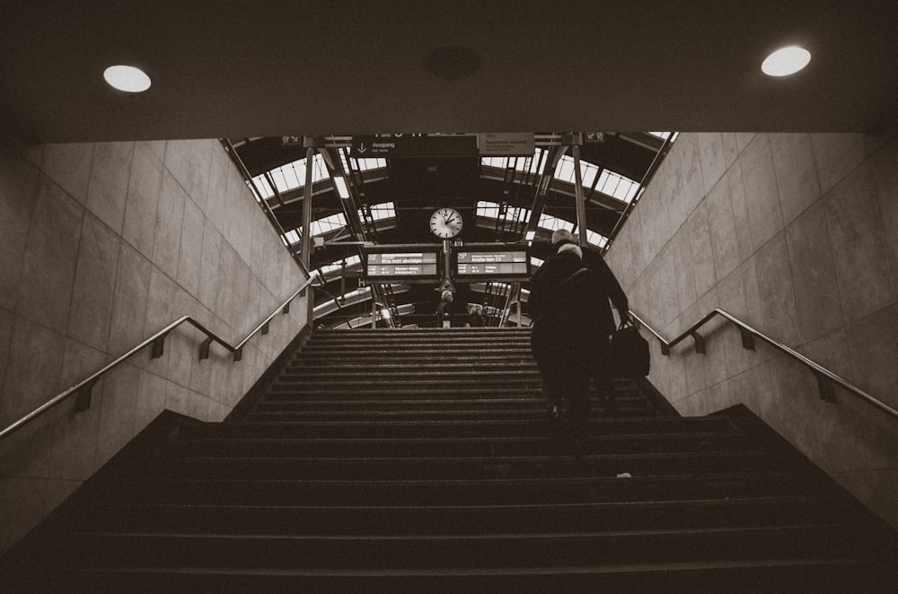 person walking on stairs