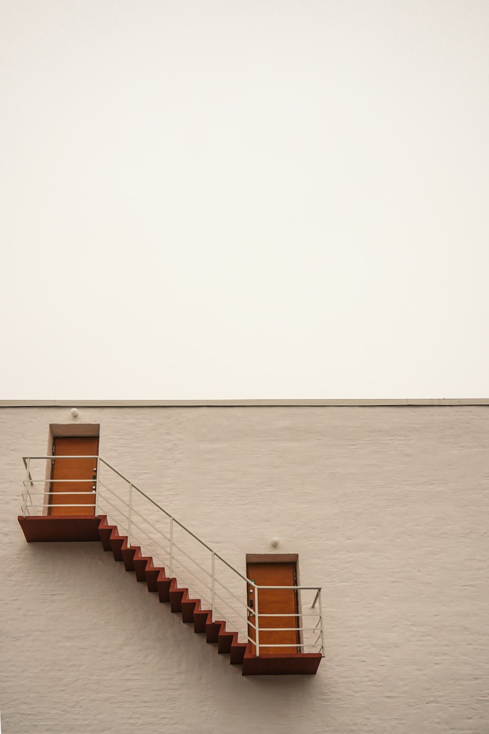 two closed orange doors