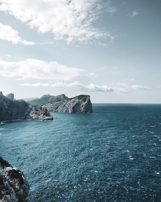 body of water under white clouds in Cap de Formentor Spain