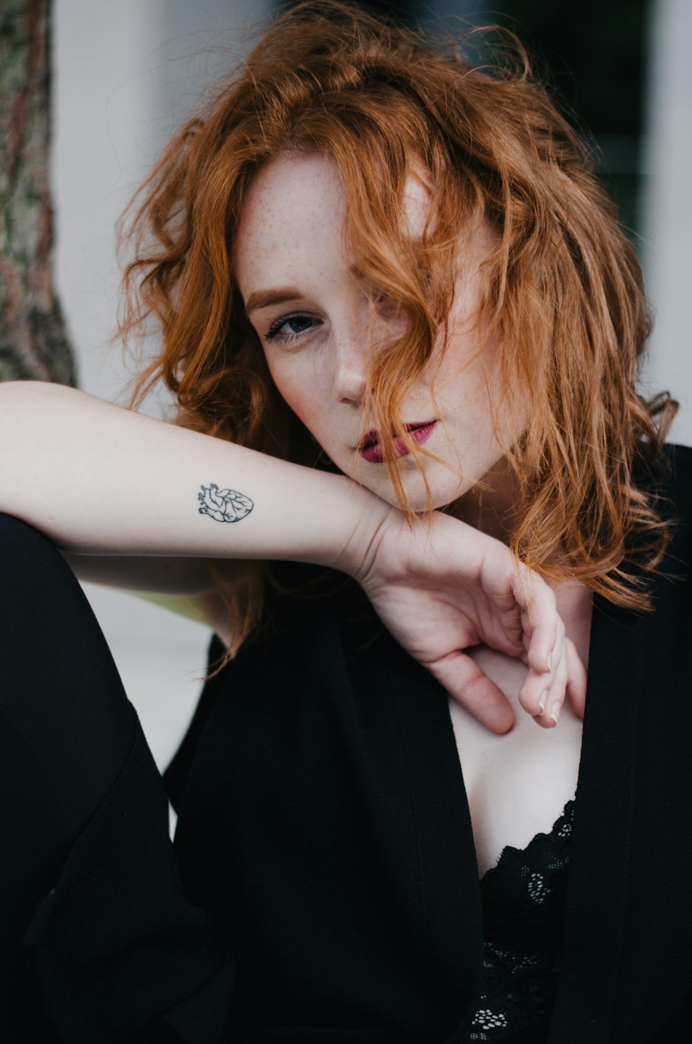 woman wearing black tank dress