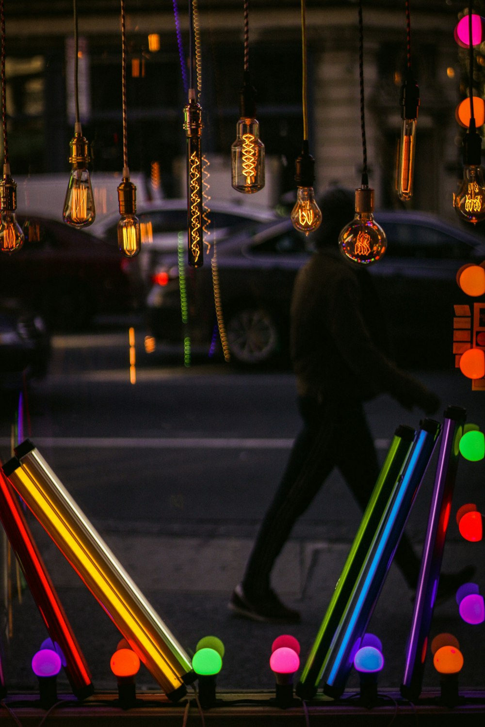 multicolored light bulb mirror frame