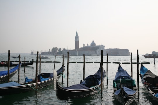 boats in pier in Church of San Giorgio Maggiore Italy