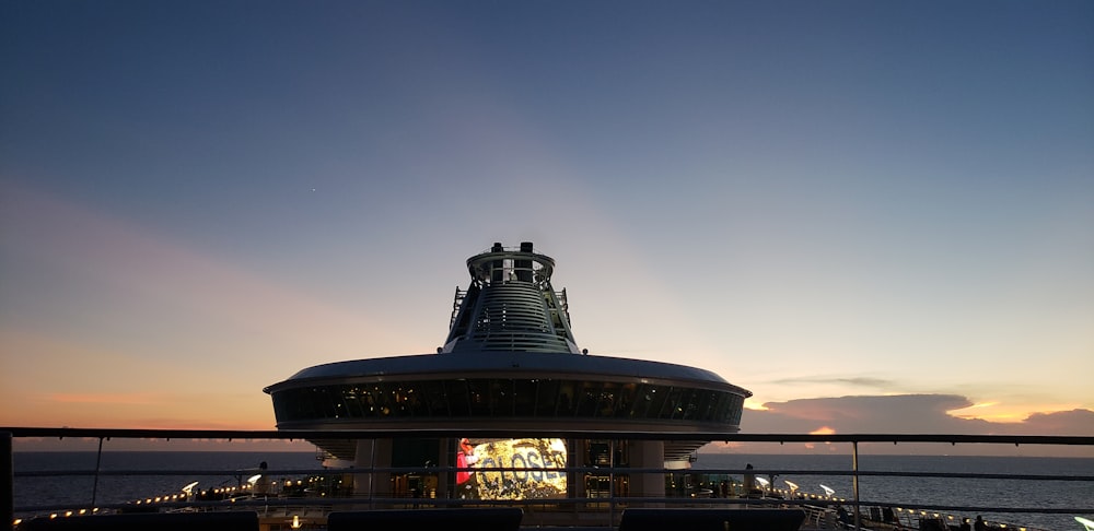 cone top building beside beach