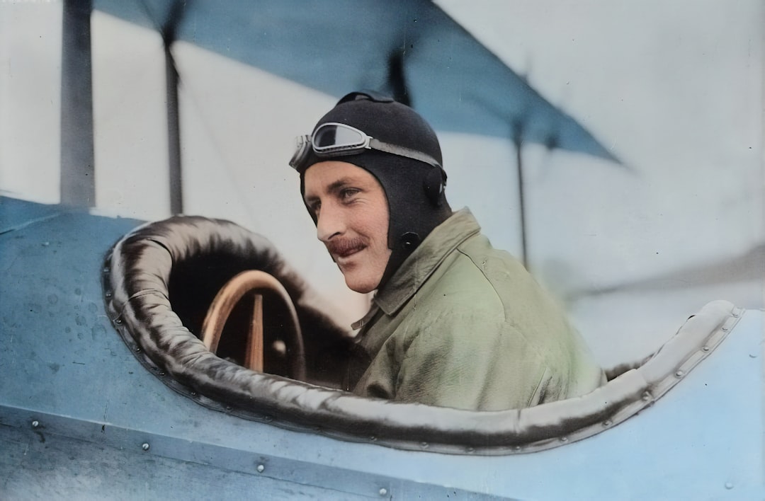 Originally from the Library of Congress, this AI recoloured photograph depicts early aviator Steve MacGordon circa 1915 in the cockpit of a biplane shortly before his death. MacGordon was one of the earliest pioneers in aviation and held many of the inaugural records in flight.