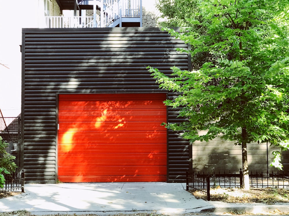 Storage containers. Modern clean lighted secure area with two neat rows of storage  containers photo – Garage door Image on Unsplash