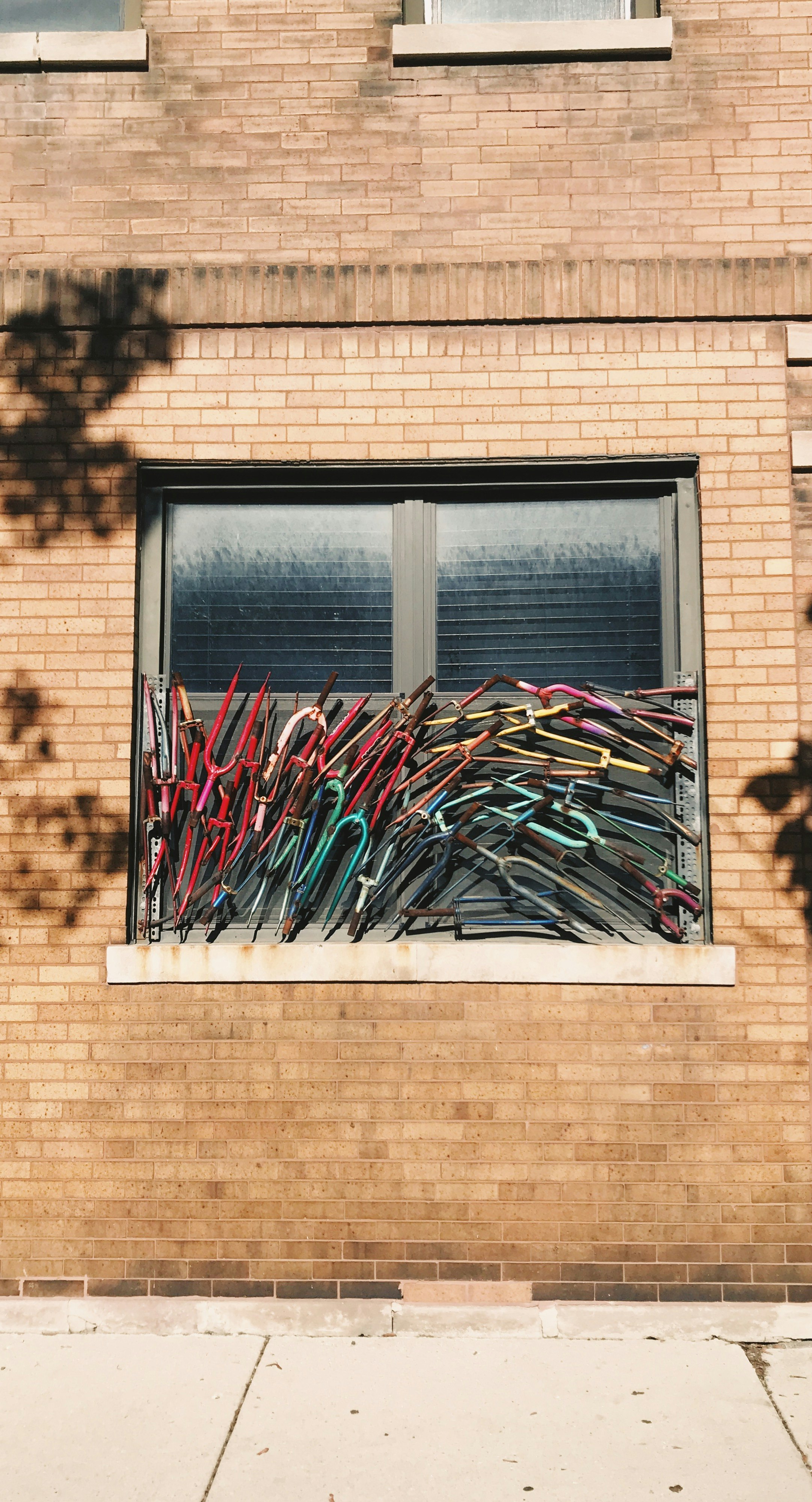 bicycle forks on window