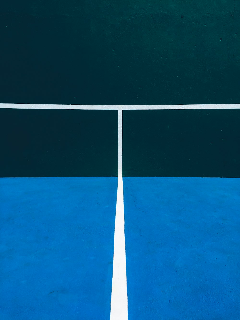 a tennis court with a white line on it