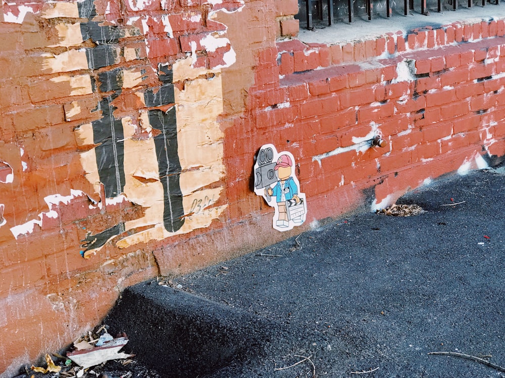 graffiti on bricked wall