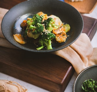 vegetable salad served on black ceramic plate