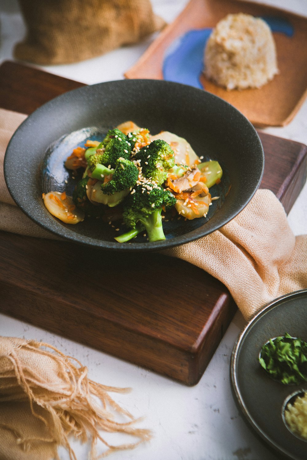 vegetable salad served on black ceramic plate