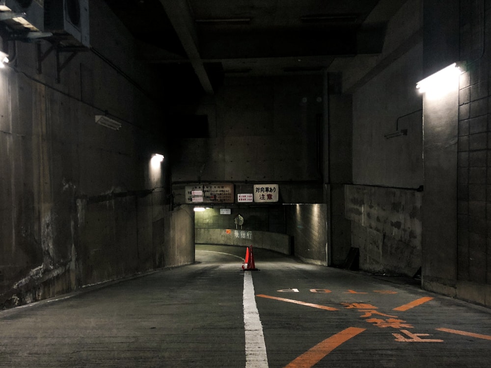 traffic cone at the center of the road