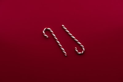 two candy canes candy cane teams background
