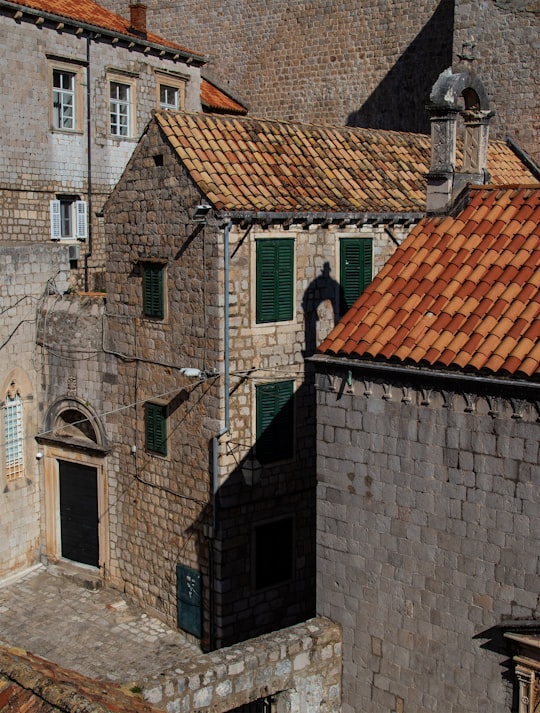 brown concrete house in Muralles de Dubrovnik Croatia