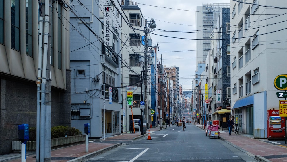 person in the middle of the road during daytime