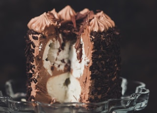 sliced chocolate vanilla cake on cake stand