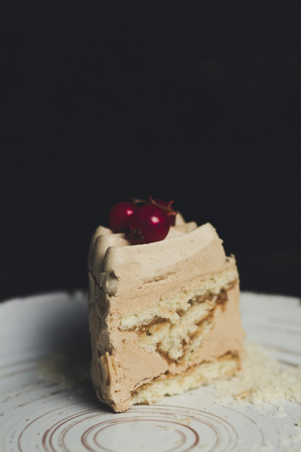 sliced white icing-covered cake