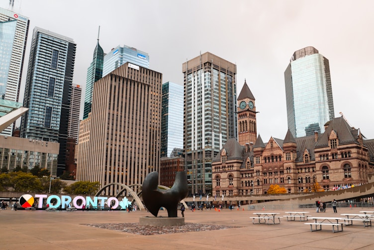 brown high-rise buildings near park cleaned by the best cleaning company in toronto