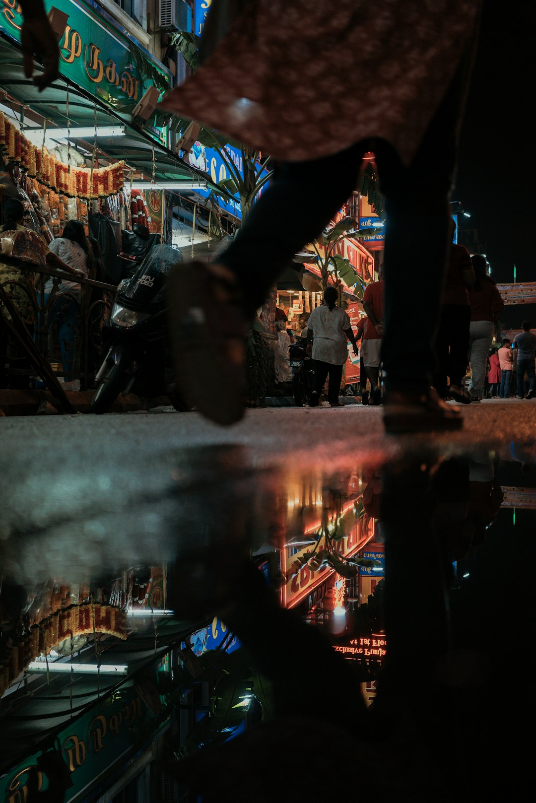 person walking near the restaurant during nighttime