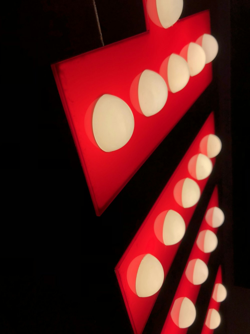 red and white lighted signs