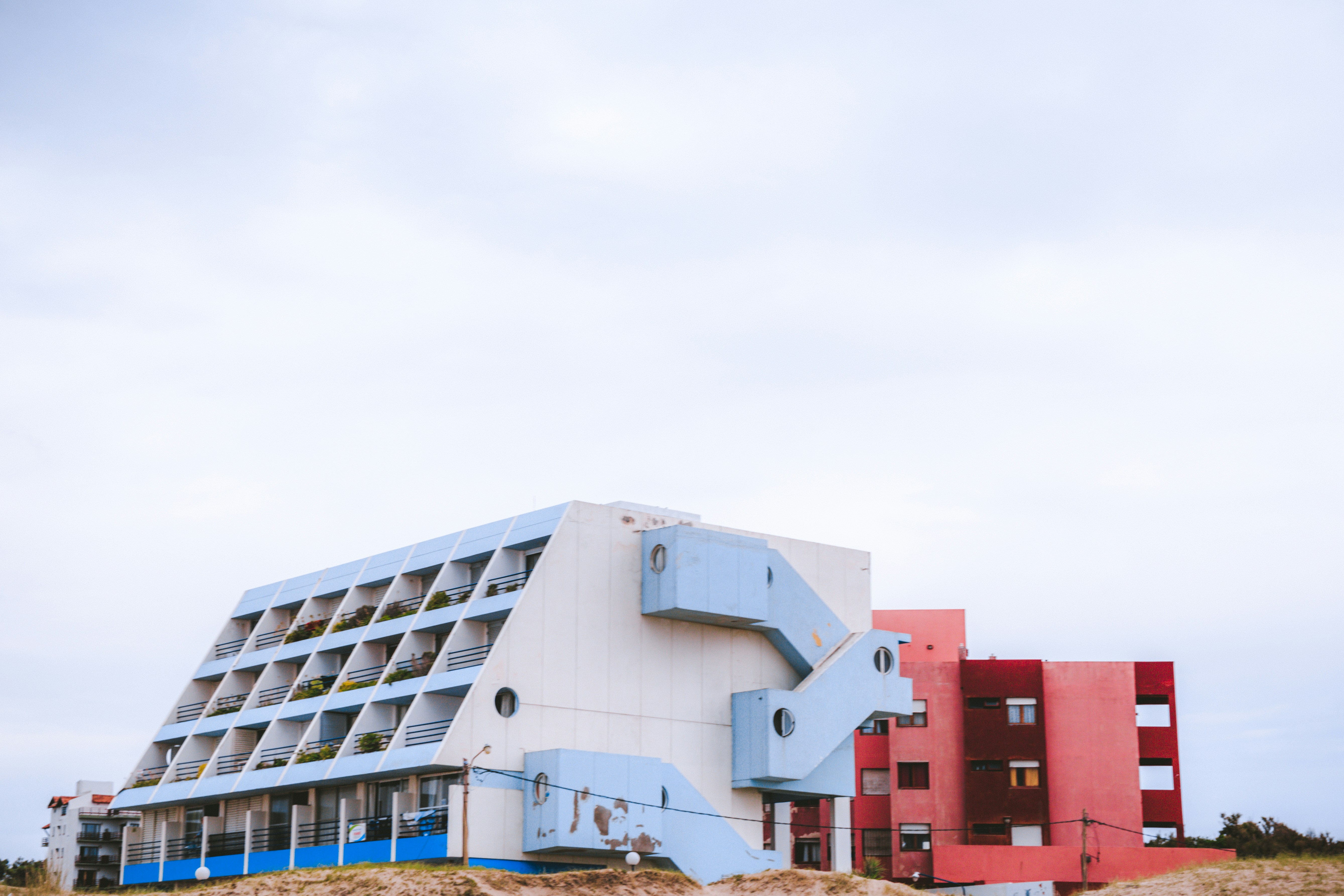 white and red concrete building photography