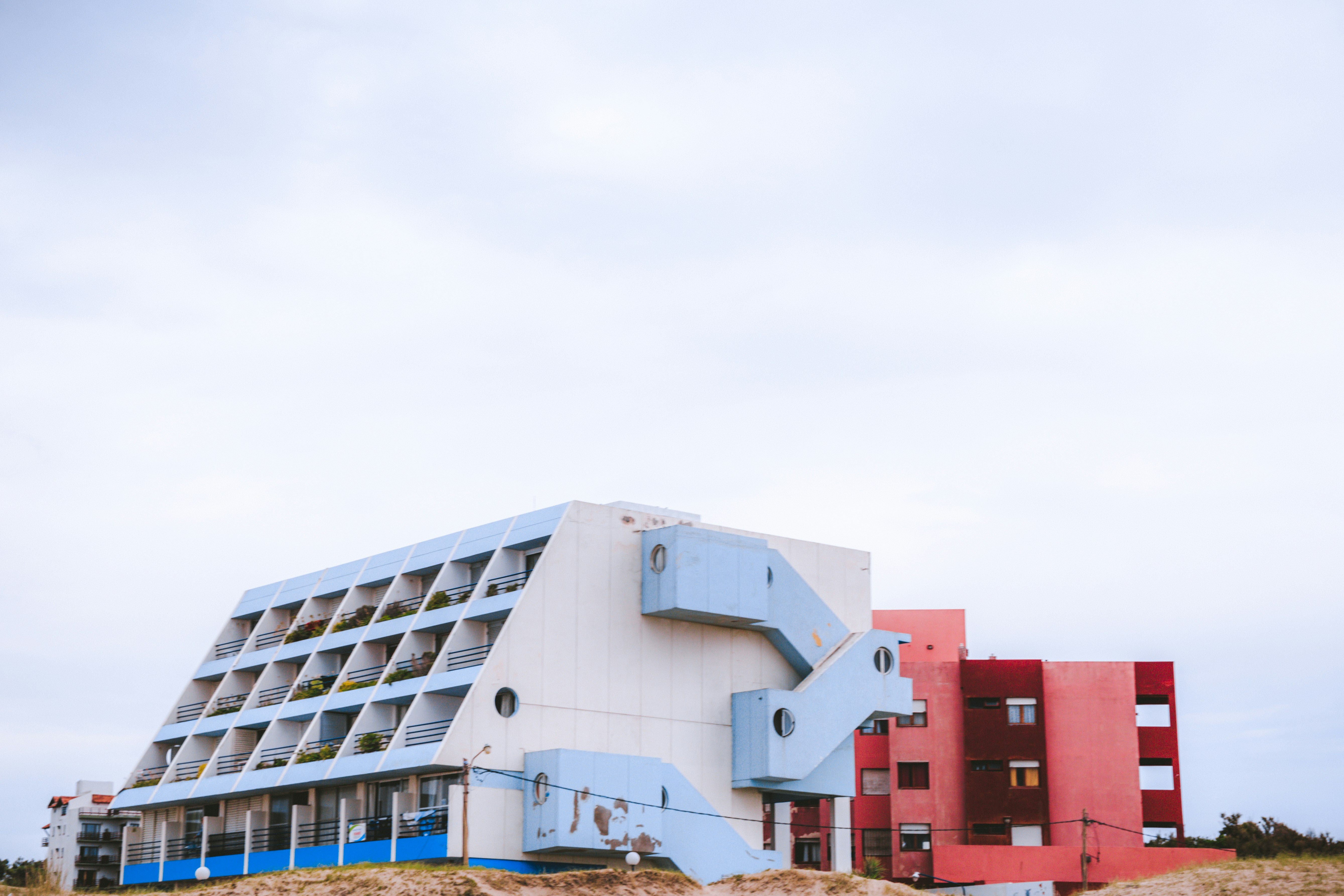 white and red concrete building photography