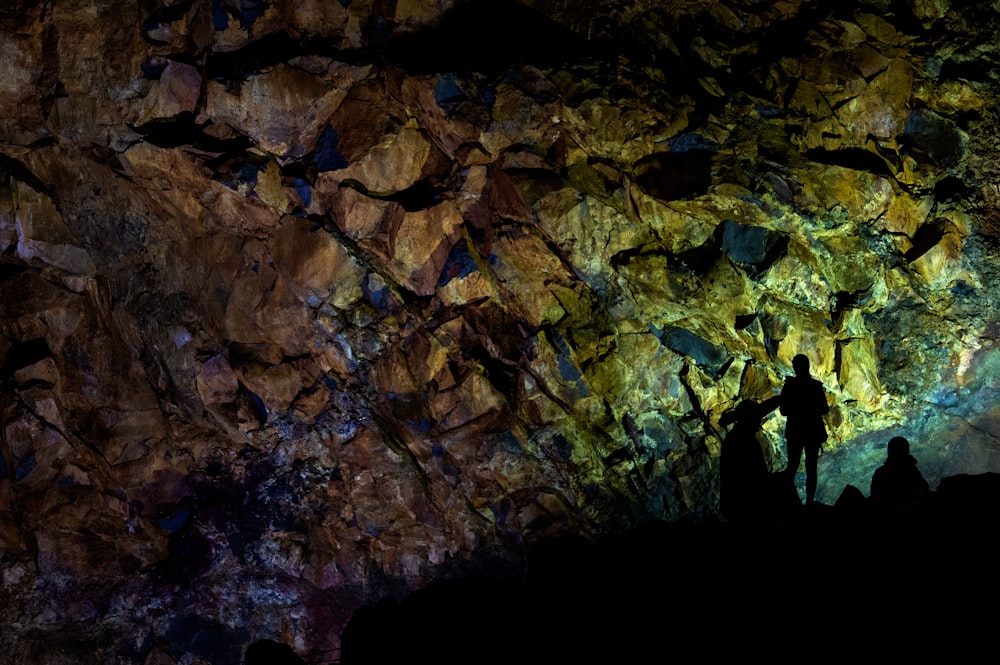 silhouette of person inside the cave