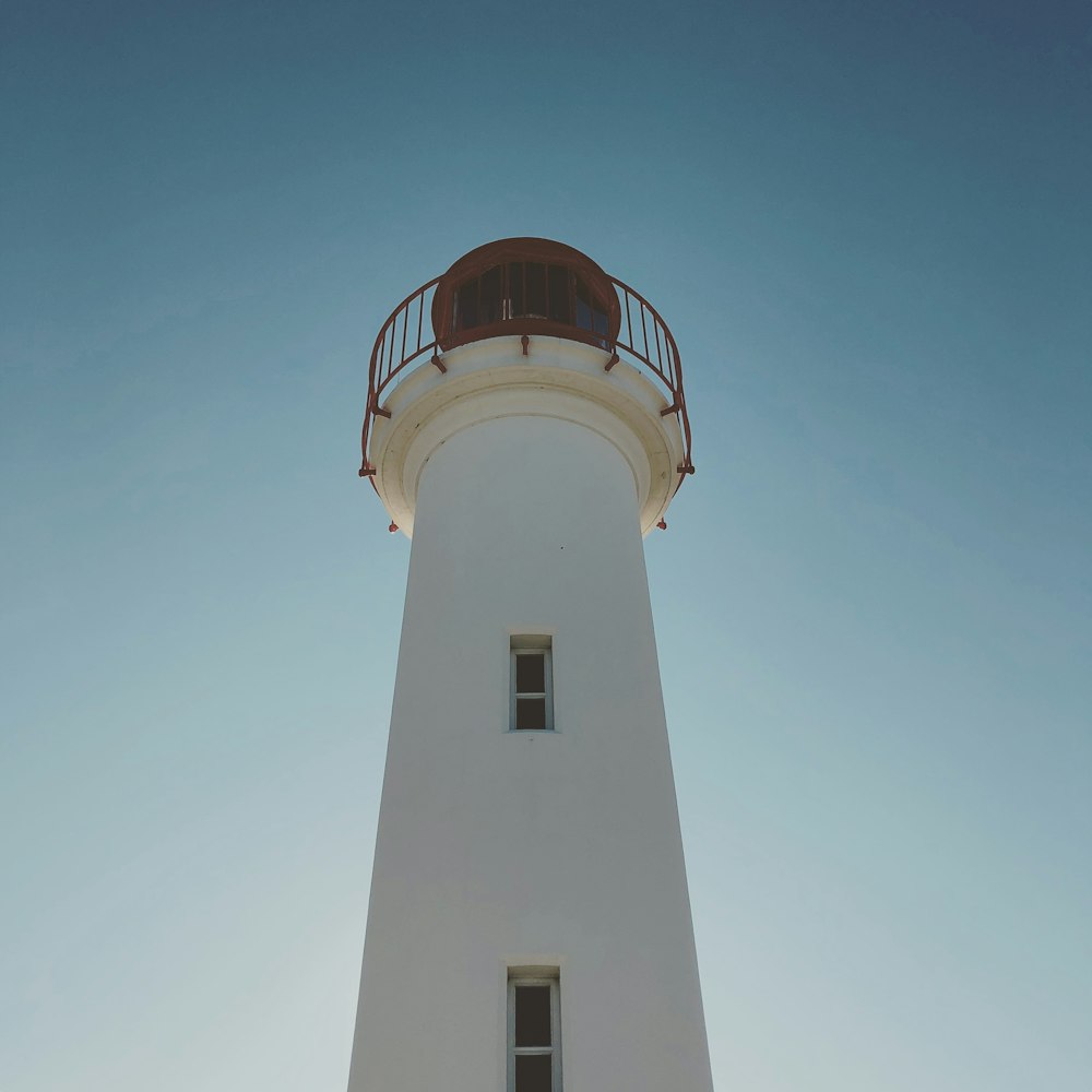 white concrete lighthouse