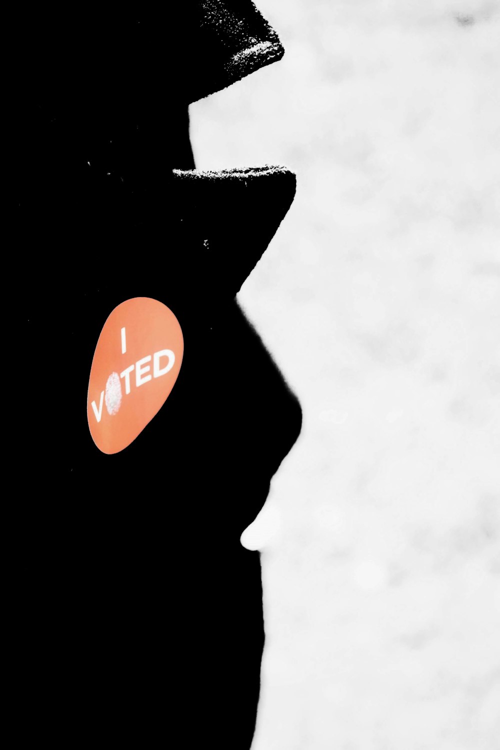 a close up of a person's face with a sticker on it