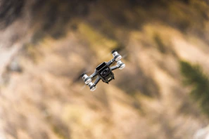 A drone in mid-flight during a student-led aerial robotics workshop.