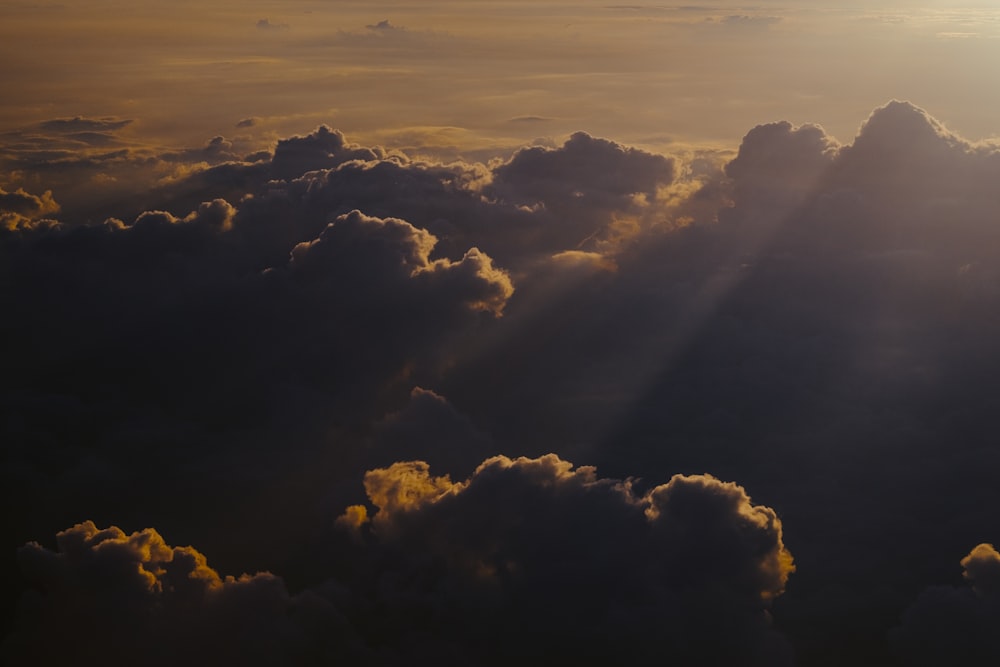 sunlight striking through clouds