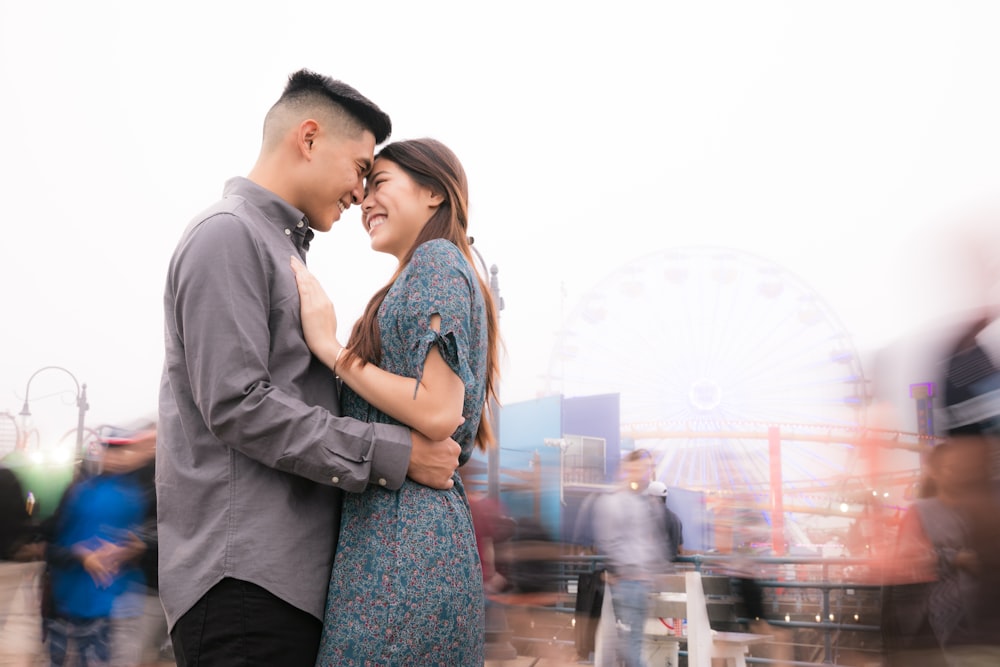 woman and man hugging on street