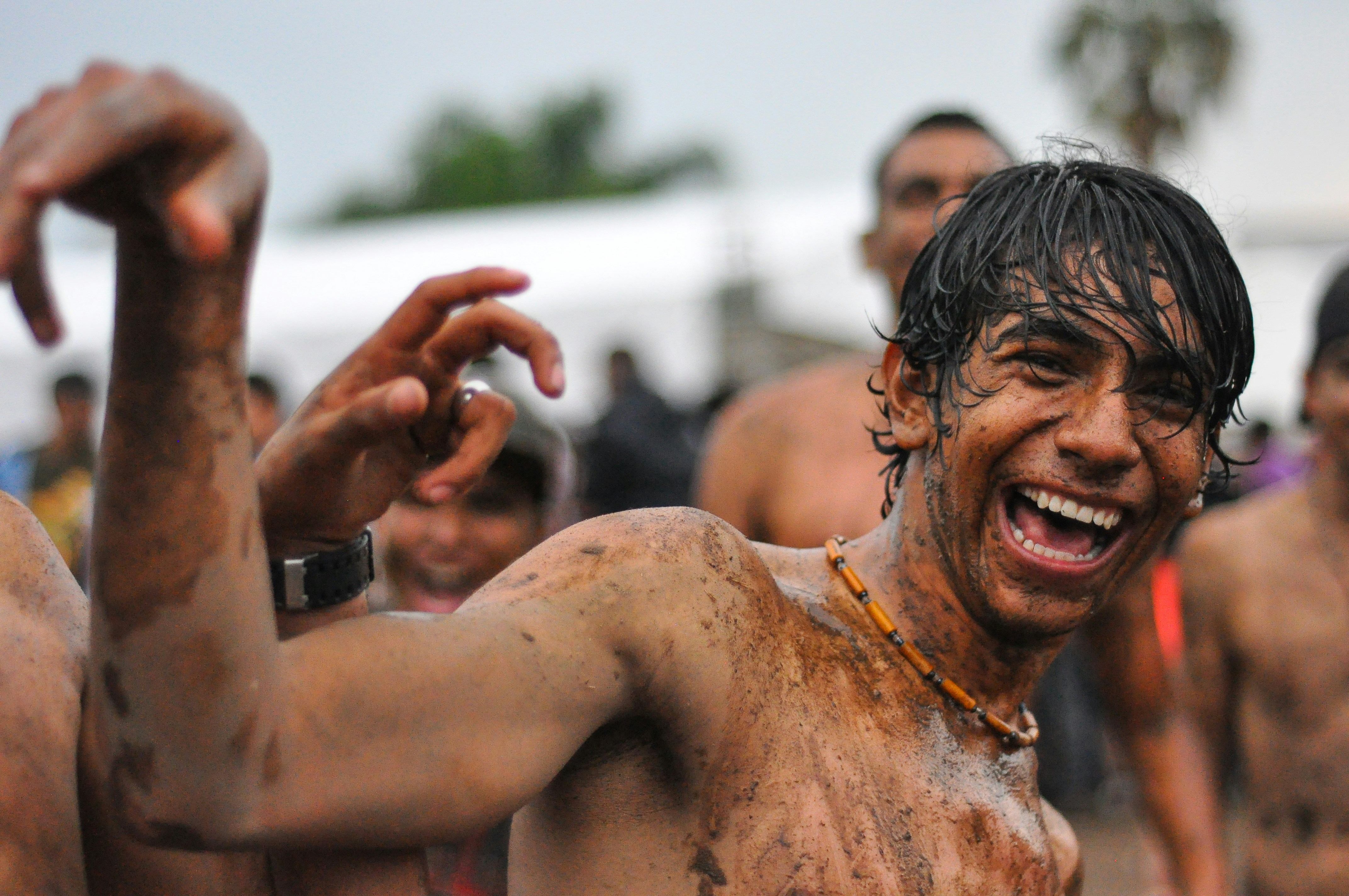 people playing mud outdoor, Smile!