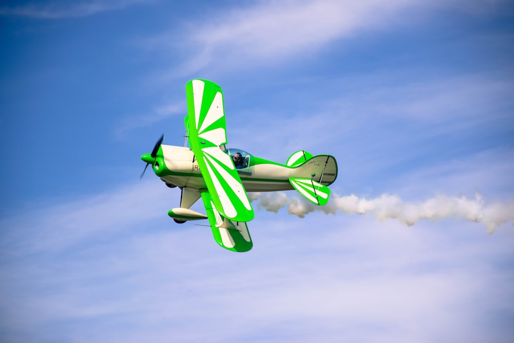 green and white airplane