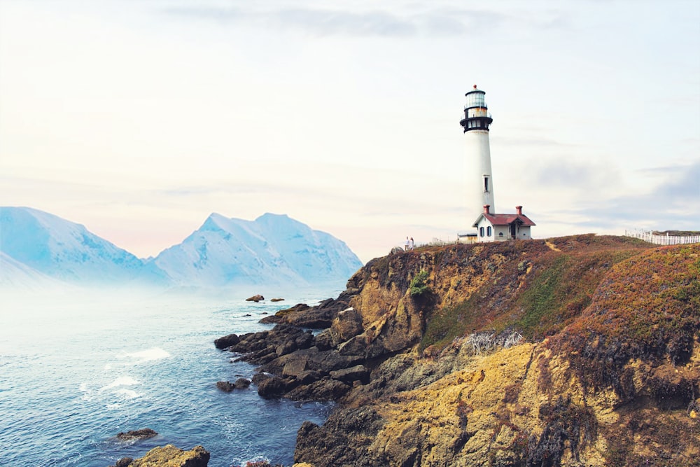 lighthouse near body of water