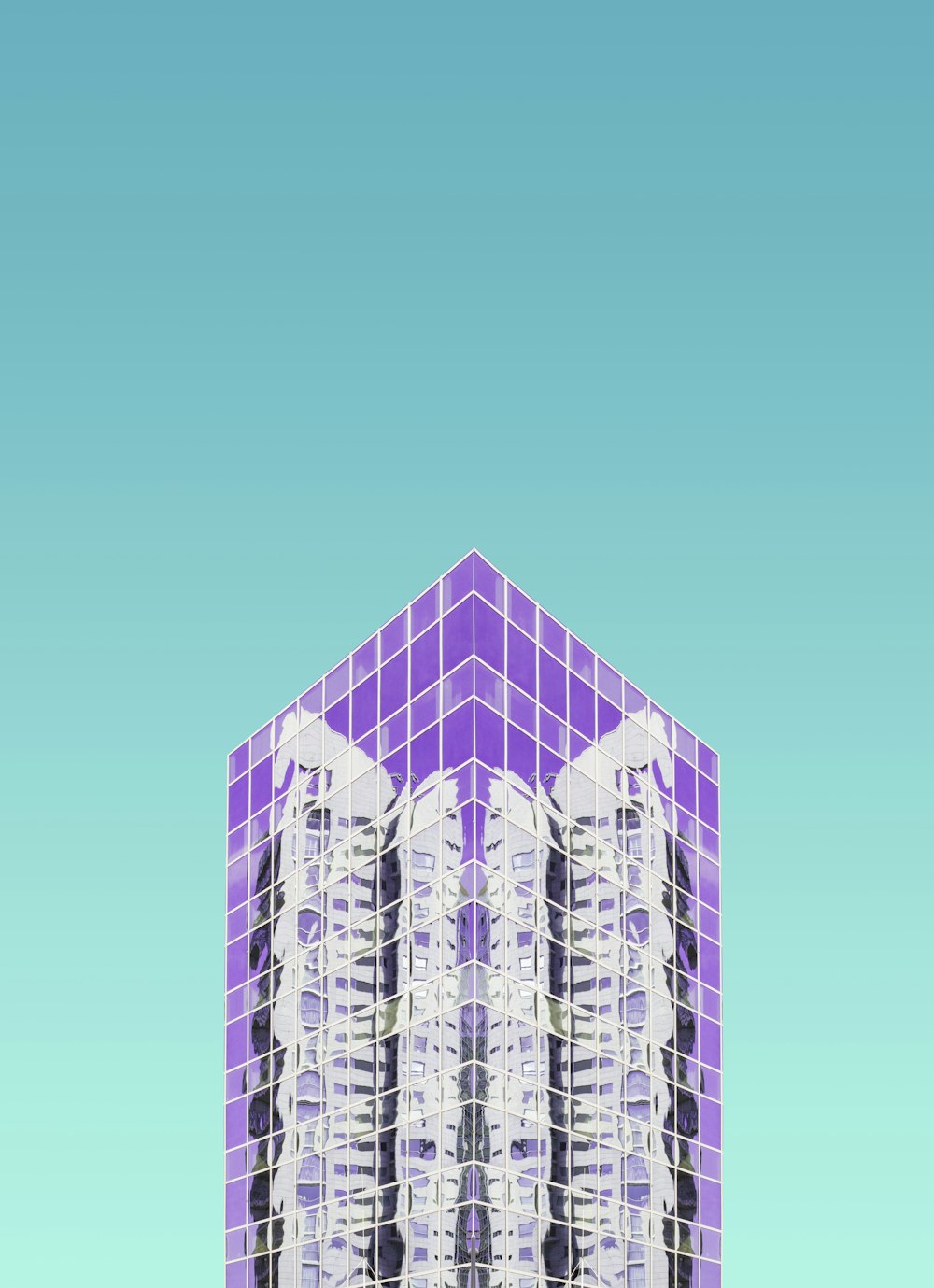 purple curtain wall building at daytime