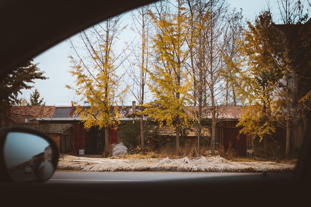 car parked on road beside house