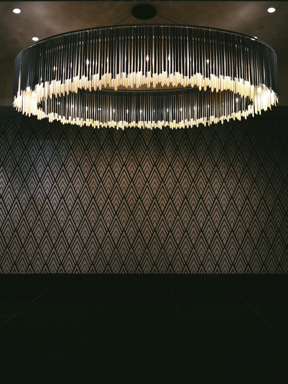 turned-on gray chandelier