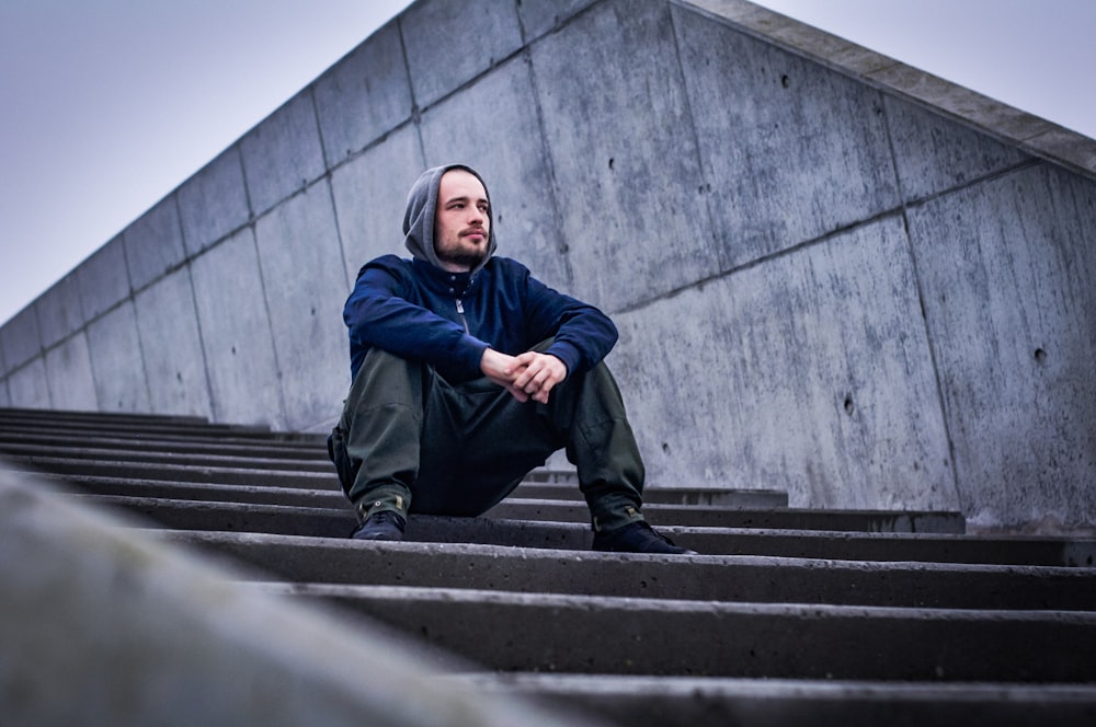 man sitting on stairs