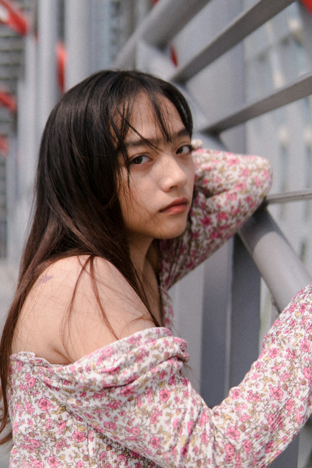 one unknown celebrity in pink floral off-shoulder long-sleeved top