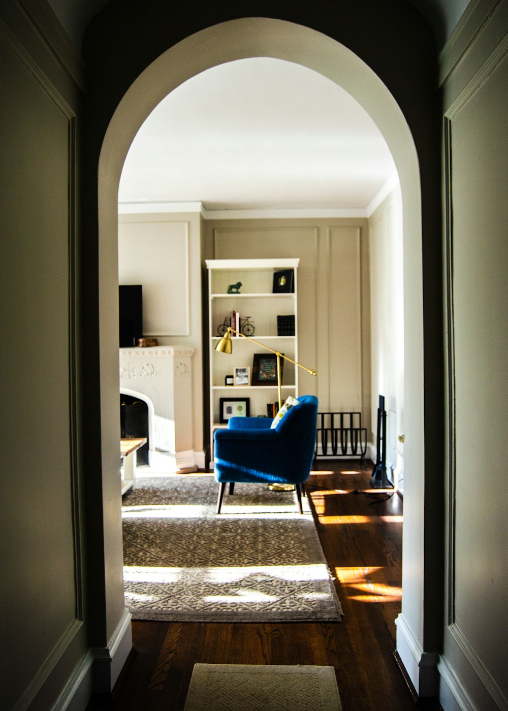 red fabric sofa on gray area mat inside room