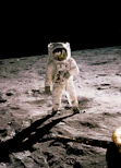 astronaut standing on gray sand